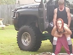 Amateur redhead in 4x4 gets fuck in public
